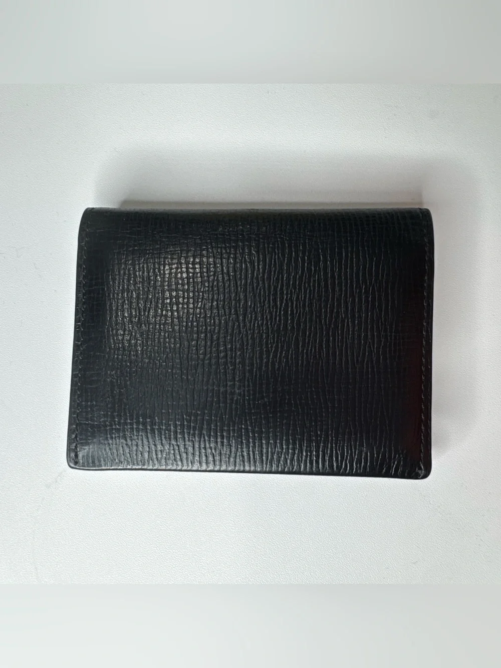 Tumi black leather